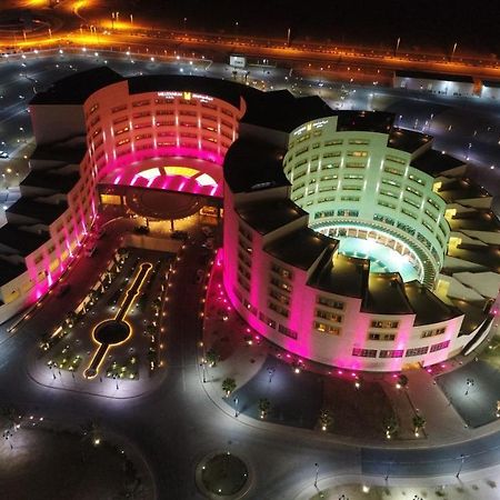 Millennium Hail Hotel Kültér fotó Aerial view of the complex