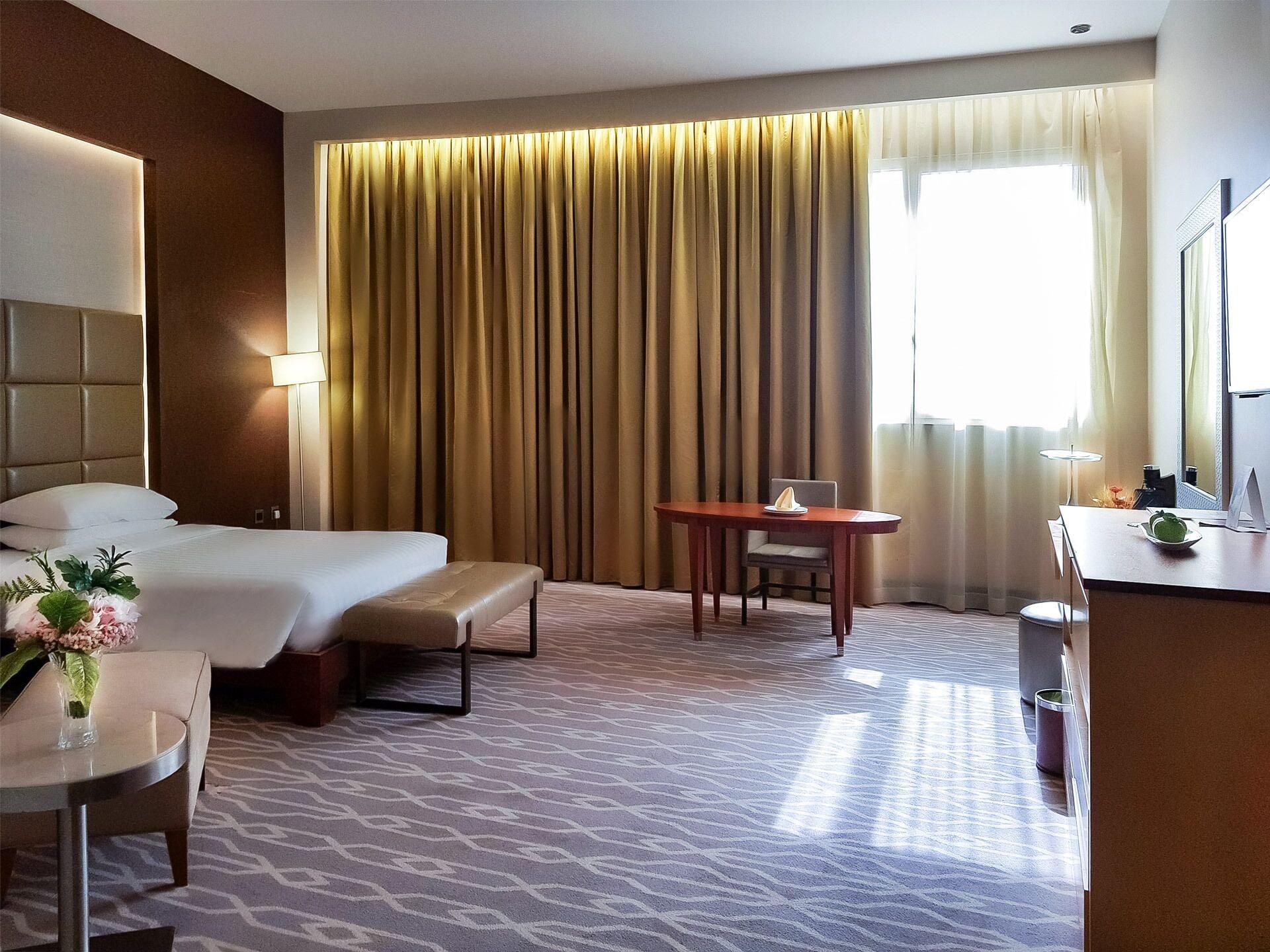 Millennium Hail Hotel Kültér fotó A room at the hotel
