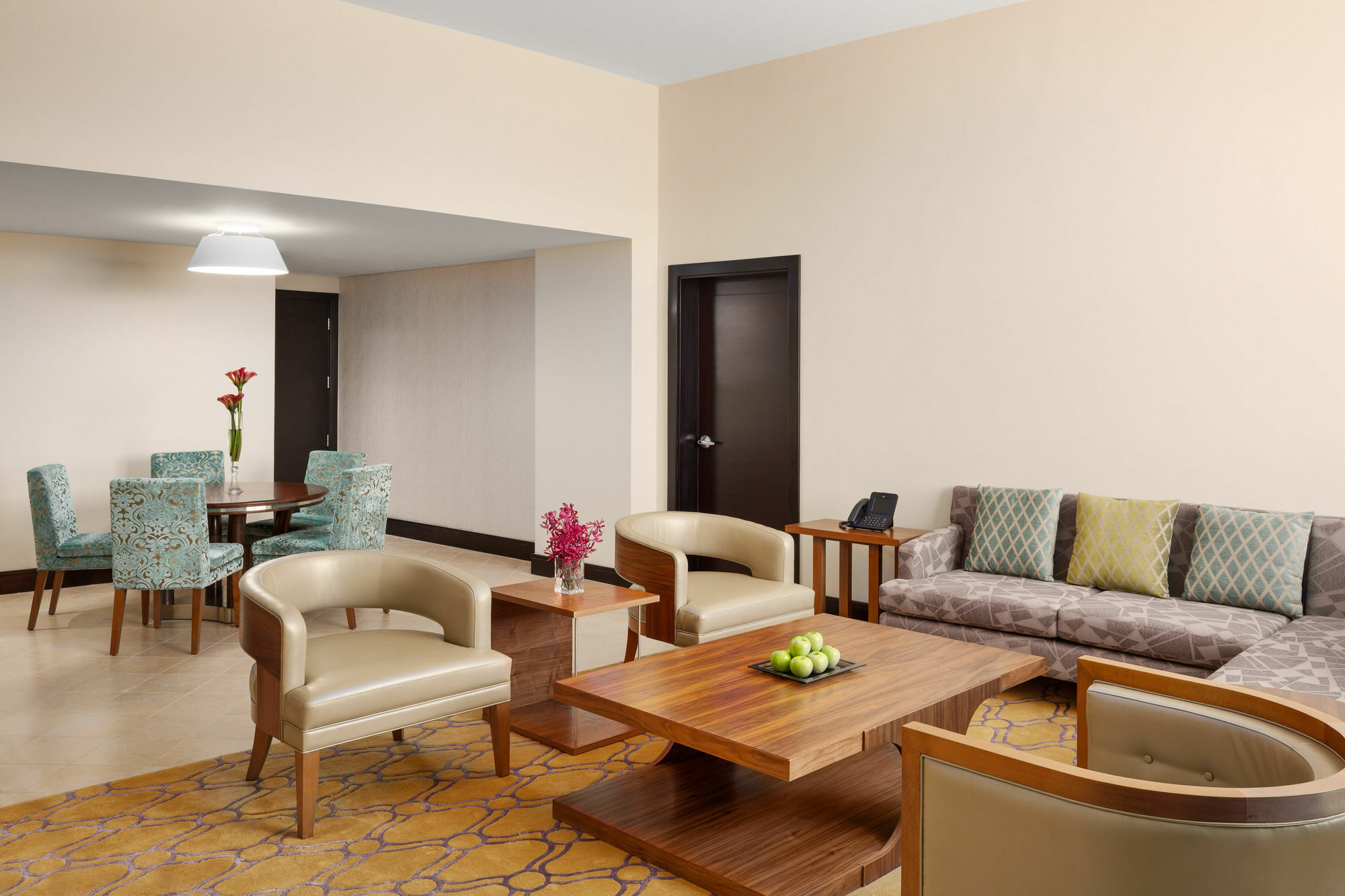 Millennium Hail Hotel Kültér fotó A living room in a suite at the hotel